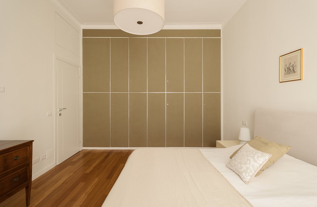 Bedroom 3 before bed reset — original messy bedding