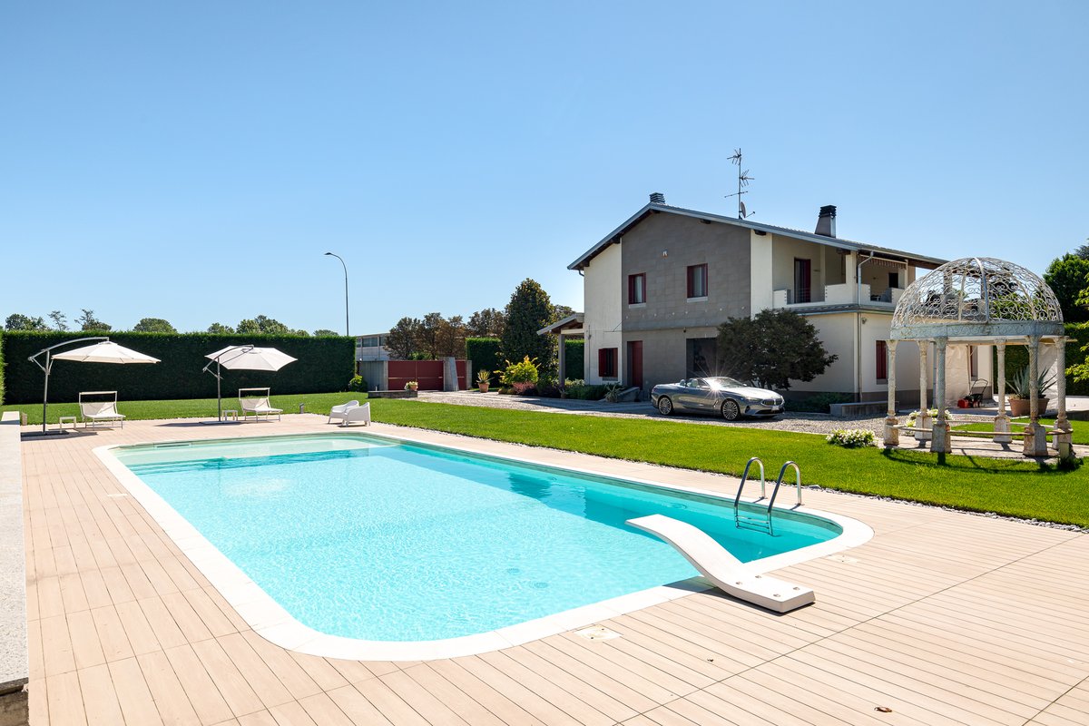 Bedroom before consistent lighting — flat midday